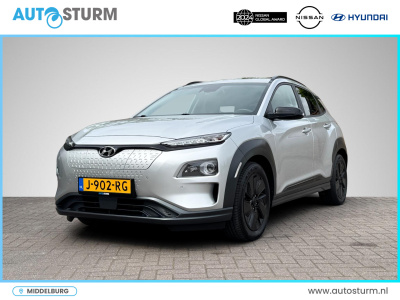 Hyundai Kona ev premium 64 kwh 3-fase lader | schuif-/kanteldak | navigatie | stoelventilatie + -verwarming | head-up display | leder | adapt. cruise control | rijklaarprijs!