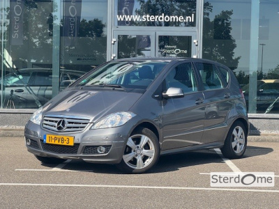 Mercedes-Benz A-Klasse 160 business class avantgarde l pts l navi l airco l regensensor l cruise controle l licht en zicht pakket l zitcomfort pakket l mistlampen l spiegels electrisch verstelbaar + inklapbaar l