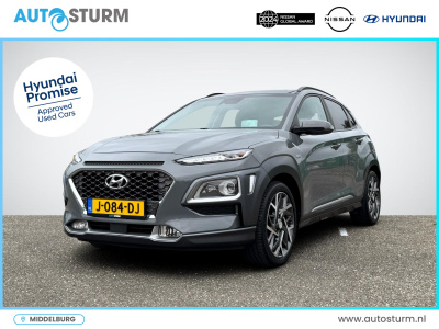 Hyundai Kona 1.6 gdi hev premium | trekhaak | head up-display | leder | stoelverwarming + -ventilatie | led koplampen | premium audio | rijklaarprijs!