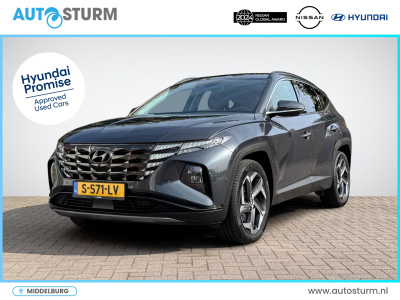 Hyundai Tucson 1.6 t-gdi phev premium 4wd | vol-leder | digitaal instrumentenpaneel | adapt. cruise control | apple carplay/android auto | stoelverwarming | dodehoek detectie | 360° camera | rijklaarprijs!