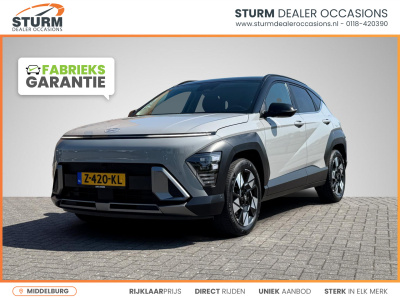 Hyundai Kona 1.6 gdi hev premium | two-tone lakkleur | stoelverwarming + -ventilatie | 360° camera | leder | navigatie | apple carplay/android auto | geheugenstoel | rijklaarprijs!