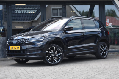 Skoda Karoq 1.5 tsi act sportline | nap | virtual cockpit | dealer onderhouden | camera | stoelverwarming | apple carplay