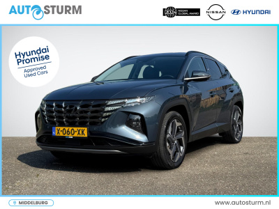 Hyundai Tucson 1.6 t-gdi phev premium 4wd | vol-leder | digitaal instrumentenpaneel | adapt. cruise control | apple carplay/android auto | stoelverwarming | dodehoek detectie | 360° camera | rijklaarprijs!