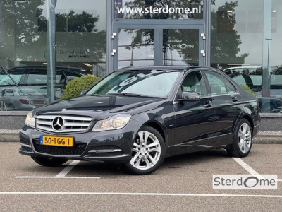 Mercedes-Benz C-Klasse 180 business class avantgarde l airco l tempomaat l regensensor l pts l comand aps l | cruise control | airco |  automaat l led dagrij verlichting l