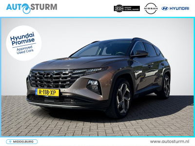 Hyundai Tucson 1.6 t-gdi phev premium 4wd | trekhaak | vol-leder | adapt. cruise control | apple carplay/android auto | stoelverwarming | dodehoek detectie | 360° camera | rijklaarprijs!