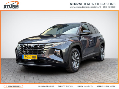 Hyundai Tucson Hybrid 1.6 t-gdi hev comfort smart | navigatie | camera | apple carplay/android auto | stuur- + stoelverwarming | elek. achterklep | rijklaarprijs!