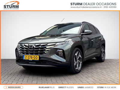 Hyundai Tucson 1.6 t-gdi phev comfort smart 4wd | navigatie | camera | apple carplay/android auto | stuur- + stoelverwarming | elek. achterklep | rijklaarprijs!