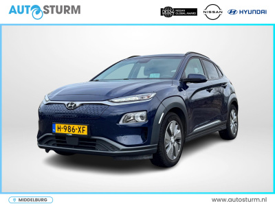 Hyundai Kona ev fashion 64 kwh design pack | head-up display | stoelverwarming | ½ leder | adapt. cruise control | dodehoek detectie | rijklaarprijs!
