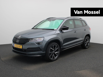 Skoda Karoq 1.5 tsi act sportline business | automaat | apple carplay / android auto | navigatie | achteruitrijcamera | virtual cockpit | verwarmde stoelen | adaptieve cruise control | elektrische achterklep | canton audio | climate c...