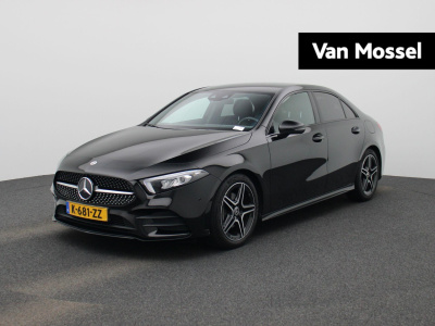 Mercedes-Benz A-Klasse 180 business solution amg | automaat | lmv | sfeer verlichting | virtual cockpit | climate control | stoel verwarming | half leder | cruise control | camera | dab | navigatie