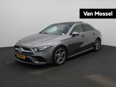 Mercedes-Benz A-Klasse 180 business solution amg | automaat | lmv | panorama dak | virtual cockpit | climate control | stoel verwarming | half leder | cruise control | camera | dab | navigatie