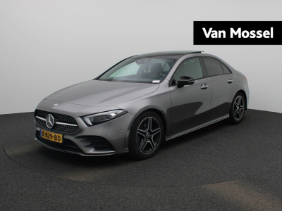 Mercedes-Benz A-Klasse 180 business solution amg | automaat | lmv | panorama dak | sfeer verlichting | virtual cockpit | climate control | stoel verwarming | half leder | cruise control | camera | dab | navigatie | climate control