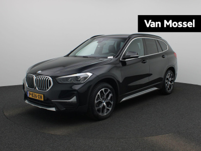 BMW X1 sdrive18i business edition | automaat | navigatie | head-up display | trekhaak | climate control | parkeersensoren | lichtmetalen velgen |