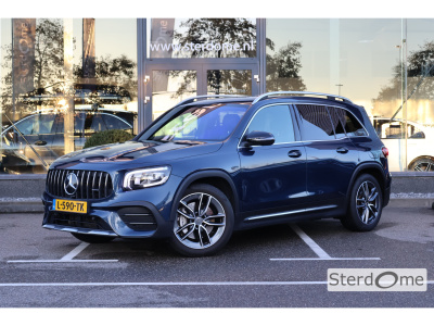 Mercedes-Benz Glb amg 35 4matic l 306 pk l mbux l camera l led l wegklapbare trekhaak l pts l airconditioning l spiegel pakket l stoelverwarming l