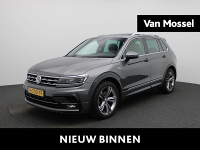 Volkswagen Tiguan 1.5 tsi act highline business r | automaat  | panoramadak | stoel verwarming | virtual cockpit | navigatie | camera | climate control | parkeer sensoren | schuifdak | lmv | led | trekhaak