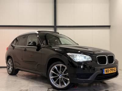 BMW X1 xdrive20i high executive | pano | stoelverwarming | leder | cruise | parkeersensoren v+a | cd/dvd