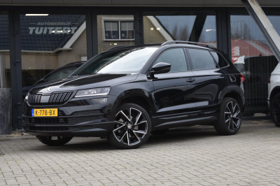 Skoda Karoq 1.5 tsi act sportline | mj21 | trekhaak | camera | virtual | nap | apple carplay | android auto