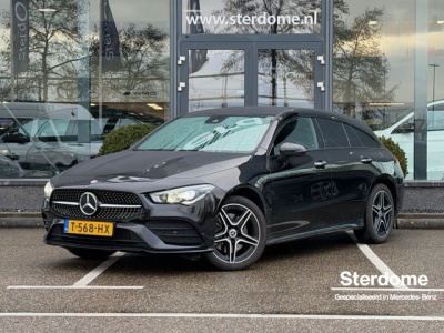 Mercedes-Benz Cla shooting brake 250 e amg line l mbux l camera l tempomaat l sfeerverlichting l led l keyless go l night pakket l dodehoek assistent l elekt. bed. achterklep l spiegel pakket l afneembare trekhaak l diefstel inbraak alarm l...