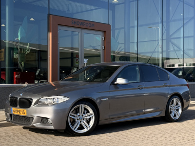 BMW 5 Serie 528i m pakket | head-up | cruise | stoelverwarming | navi | leder