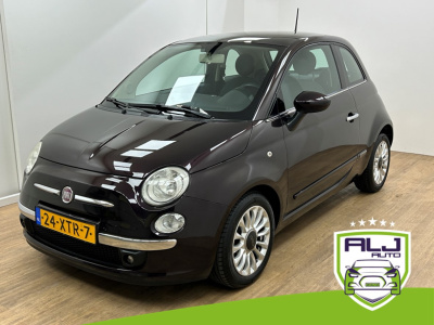 Fiat 500 occasion lounge met panoramadak en unieke kleur | tweedehands fiat 500 in paarsmetallic | airco | elek ramen | radio aux