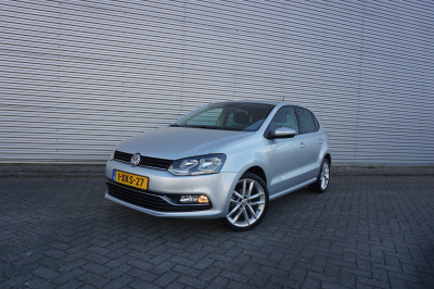 Volkswagen Polo 1.2 tsi highline climate / cruise / bt / parkeers. / elektr. ramen / lm velgen / nap