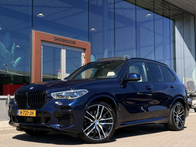 BMW X5 xdrive45e m-sport individual | b&o | sky lounge | luchtvering | massage | soft close | laser | 22 velgen