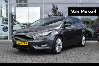 Ford Focus wagon 1.0 titanium edition | wegklapbare trekhaak | climate control | cruise control | voorruitverwarming | parkeersensoren v + a |