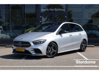 Mercedes-Benz B-Klasse 220 amg line l panoramadak l nightpakket l led high performance l mbux l camera l smartphone integratie l stoelverwarming l pts l airconditioning l elektr. bedienbare achterklep l
