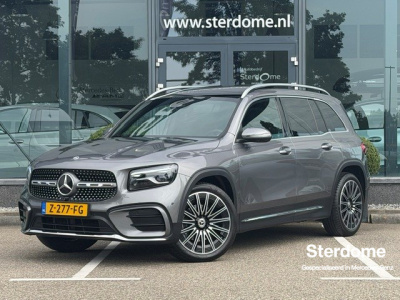 Mercedes-Benz Glb 200 amg line premium plus l panoramadak l mbux l multibeam led l 360 gr camera l wegklapbare trekhaak l keyless go l sfeerverlichting l memory l stoelverwarming burmester l elektrisch bedienbare achterklep l automatische a...