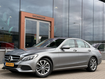 Mercedes-Benz C-Klasse 180 prestige | schuif/kanteldak | trekhaak | stoelverwarming | cruise | sfeerverlichting | half leder | navi | bleutooth |