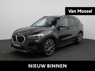 BMW X1 sdrive18i high executive | apple carplay / android auto | stoel- stuurverwarming | adaptive cruise control | memory seats | heads-up | elektrische achterklep | leder | navigatie | climate control | lichtmetalen velgen |
