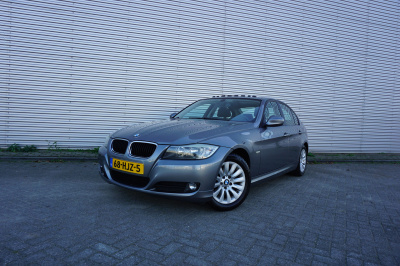 BMW 3-serie 318i business line climate / navi / cruise / pano / elektr. ramen / parkeers. / lm velgen / nap
