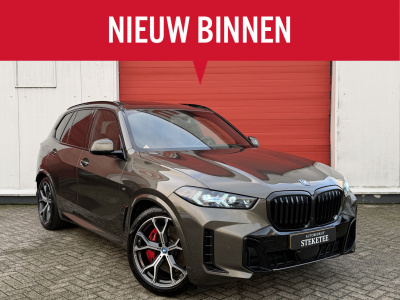 BMW X5 xdrive50e m-sport | pano | luchtvering | elek. trekhaak | rijklaar inclusief 1 jaar bmw premium selection!