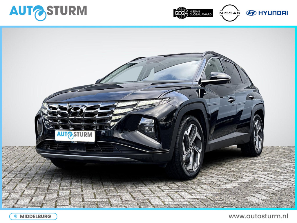 Hyundai Tucson 1.6 t-gdi mhev premium | vol-leder | digitaal instrumentenpaneel | adapt. cruise control | apple carplay/android auto | stoelverwarming | dodehoek detectie | 360° camera | rijklaarprijs!