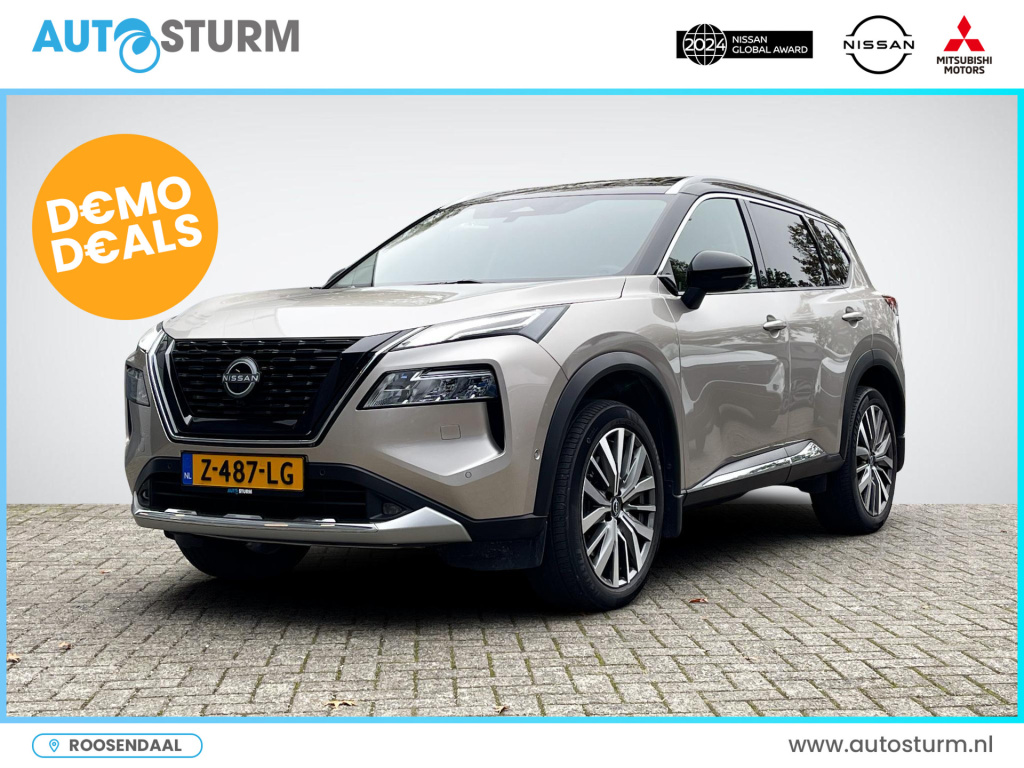 Nissan X-Trail 1.5 e-4orce tekna 4wd panoramadak | trekhaak afneembaar | 20'' velgen | head-up display | adapt. cruise control | leder | stuur- + stoelverwarming | rijklaarprijs!
