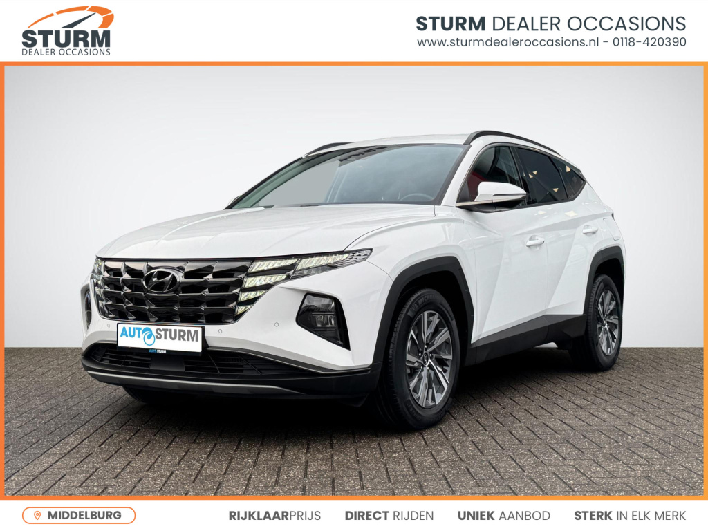 Hyundai Tucson 1.6 t-gdi mhev comfort smart | navigatie | camera | 1650kg trekgewicht | apple carplay/android auto | premium audio | elek. achterklep | stuu- + stoelverwarming | rijklaarprijs!