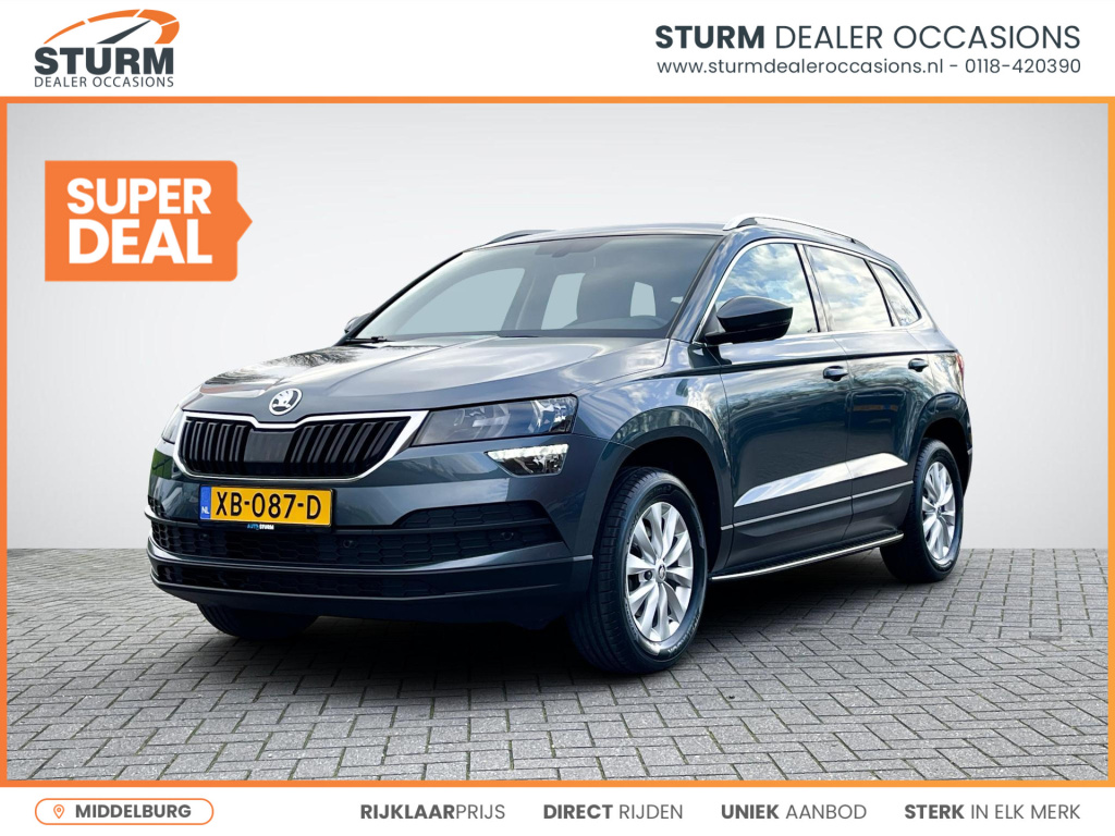 Skoda Karoq 1.0 tsi clever edition | trekhaak | apple carplay/android auto | navigatie | treeplanken | park. sensoren | cruise & climate contol | rijklaarprijs!