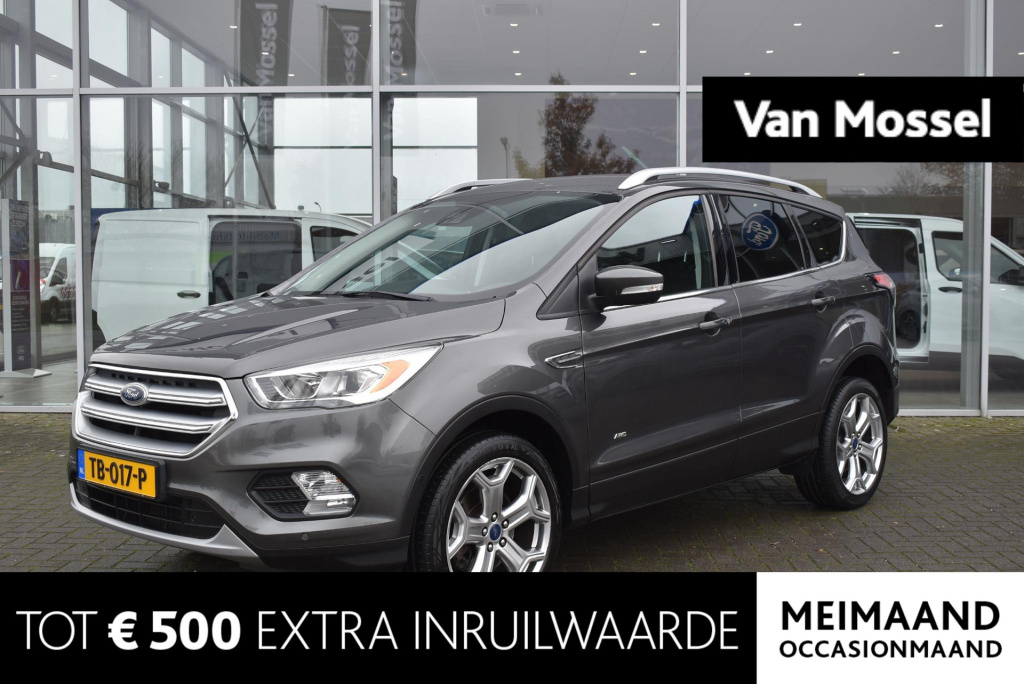 Ford Kuga 1.5 titanium 4wd | climate control | cruise control | achteruitrijcamera | elektrisch wegklapbare trekhaak | elektrisch bedienbare achterklep | voorruit verwarming | 19 inch lichtmetalevelgen |