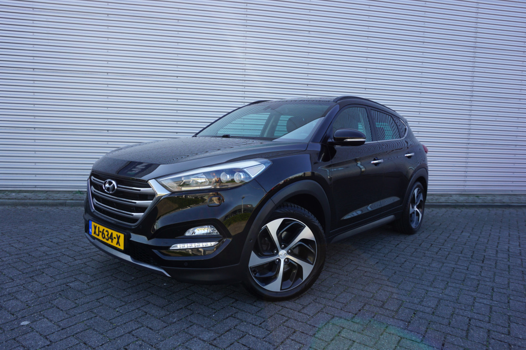 Hyundai Tucson 1.6 t-gdi premium 4wd automaat panoramadak / leder / afn. trekhaak / cruise / navi