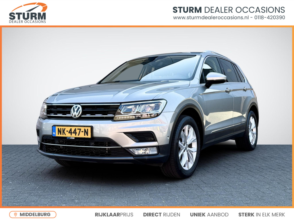 Volkswagen Tiguan 2.0 tsi 4motion highline | trekhaak uitklapbaar | stoelverwarming | navigatie full-map | digitaal instrumentenpaneel | camera | led koplampen | adapt. cruise control | rijklaarprijs!