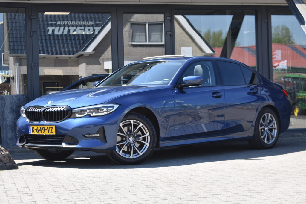 BMW 3-serie 320i high executive | harman kardon | schuif kanteldak | leder | stoelverwarming | sfeerverlichting | apple carplay