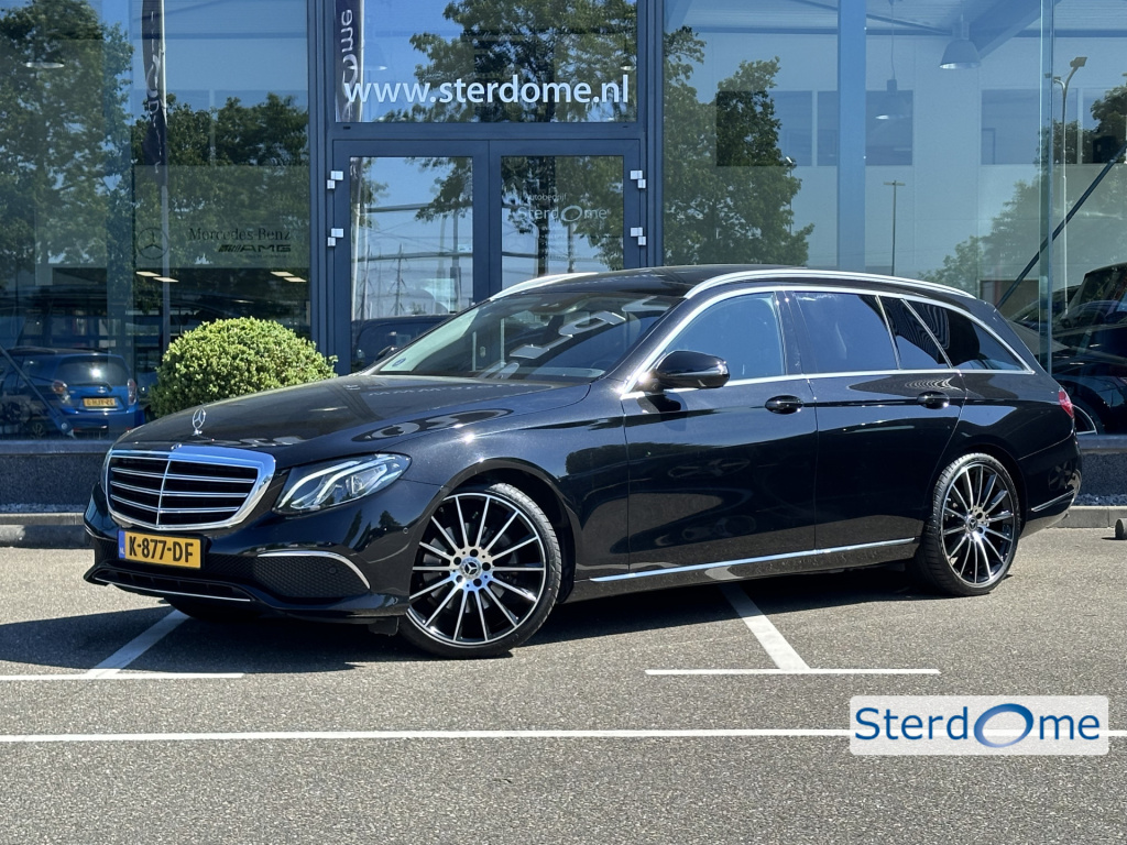 Mercedes-Benz E-Klasse estate 200 premium luxury l panorama dak l massage l camera l memorypakket l stoelverwarming l sfeerverlichting l elek trekhaak l l elektrische achterklep l led high performance l apple carplay l dodehoekpakket i comand i ...