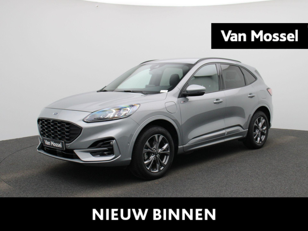 Ford Kuga phev st-line x | climate control | adaptieve cruise control | winterpakket | bang & olufsen premium geluidsysteem | elektrisch bedienbare kofferklep | apple carplay/android auto |