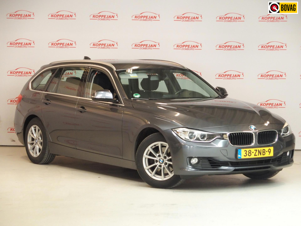 BMW 3-serie touring 320i high executive nl auto, leder, trekhaak