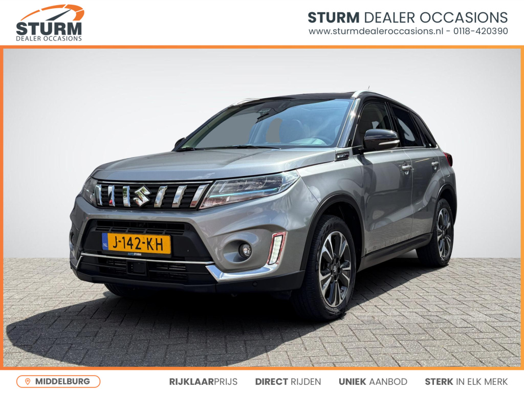 Suzuki Vitara 1.4 boosterjet comfort smart hybrid | trekhaak afneembaar | panoramadak | navigatie | camera | stoelverwarming | dodehoek | adapt. cruise control | rijklaarprijs!