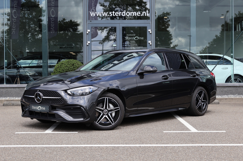 Mercedes-Benz C-Klasse estate 300 e amg line l distronic l mbux l stoelverwarming l digital light l night pakket l 360 gr camera l smart phone integratie l niveau regeling l sfeerverlichting l wegklapbare trekhaak l multicontourstoelen l airco l...