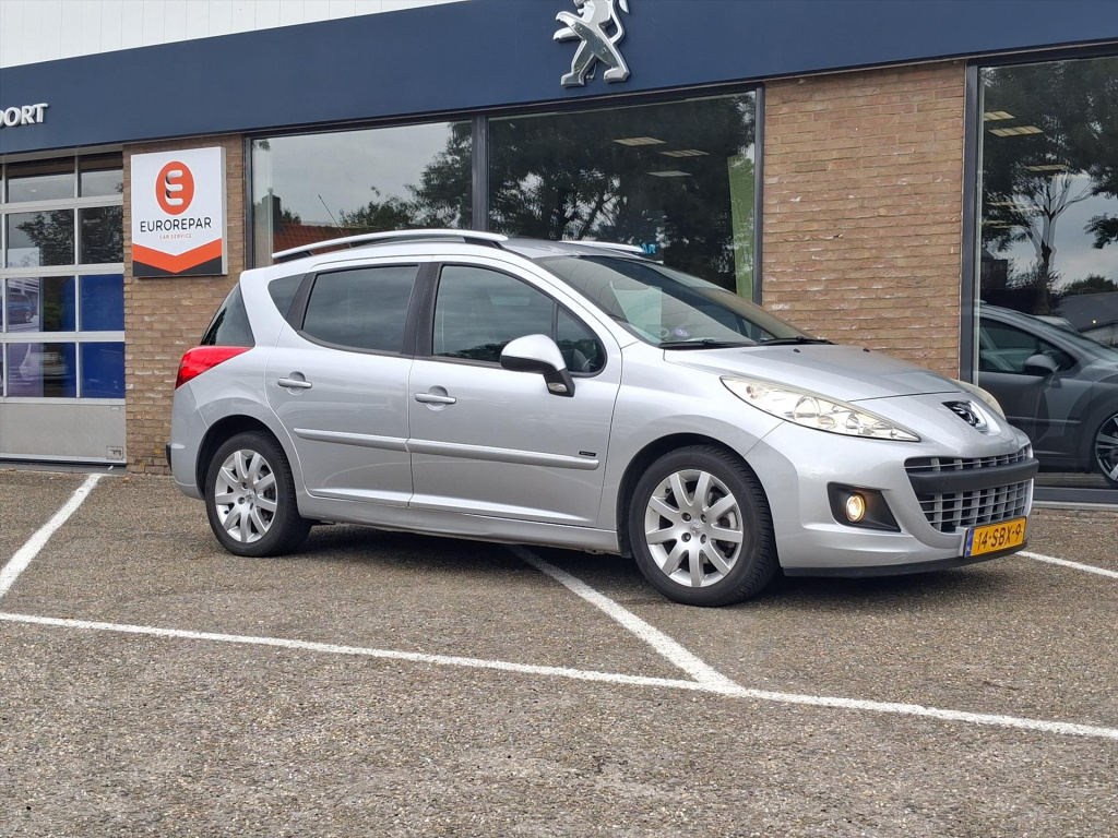 Peugeot 207 sportium 1.6 vti 120pk trekhaak | cruise control | airco | bluetooth bellen | lm-velgen 16inch | dealer onderhouden!