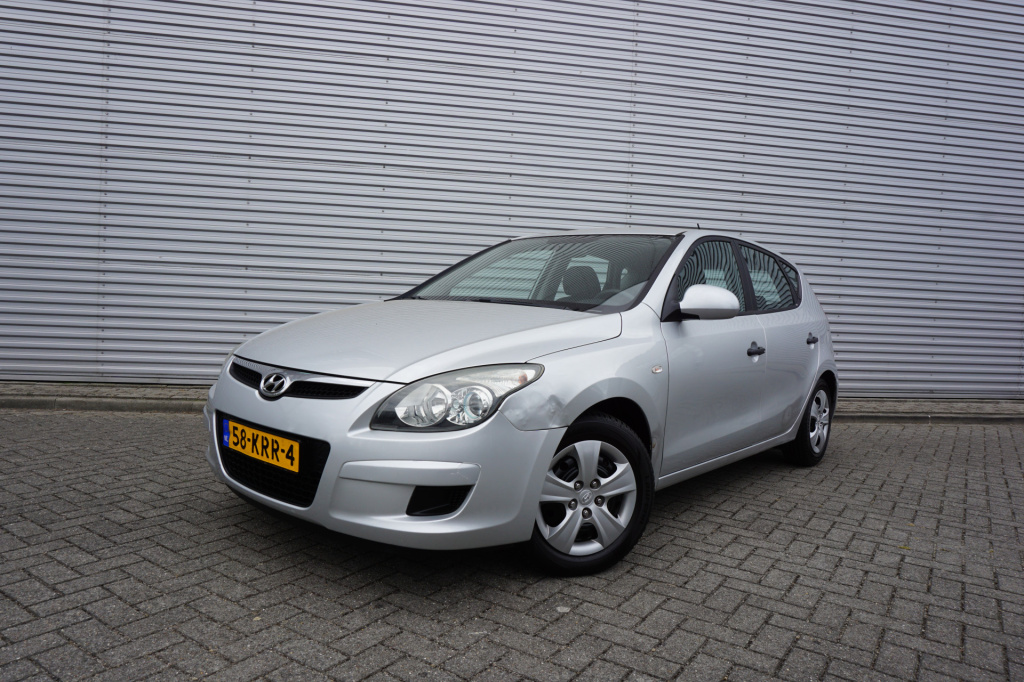 Hyundai I 30 1.4i active cool airco / elektr. ramen / parkeers. / cruise / nap