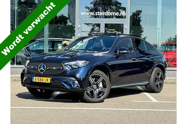 Mercedes-Benz Glc coupé 300e 4matic amg line l panoramadak l niveau- regeling l keyless go l rij-assistentie plus l digital light l memory pakket l mbux l 360 gr camera l trekhaak wegklapbaar l dab l sfeerverlichting l burmester l night pak...