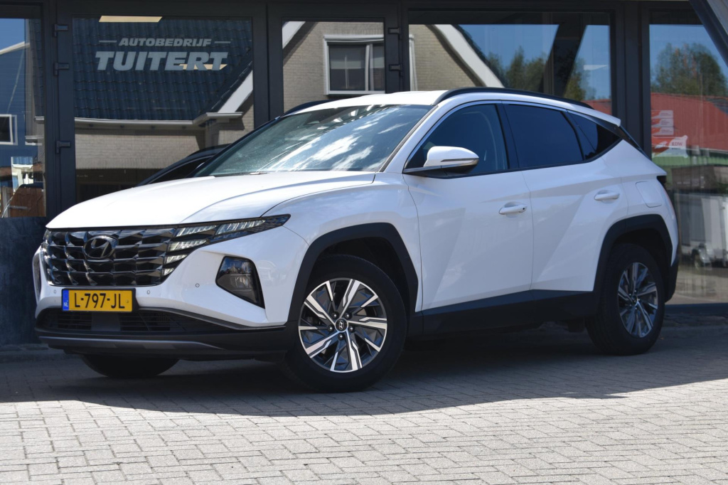 Hyundai Tucson Hybrid 1.6 t-gdi hev camera | stoelverwarming | dealer onderhouden | apple carplay | android auto | adapt. cruise controle